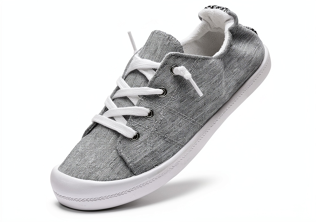Womens canvas slip-on shoes in black, white, and grey colors displayed together